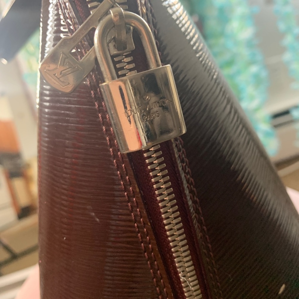 Louis Vuitton top handle bag.
